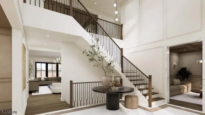 Rendering of the great room at 776 Commanche Lane with a fireplace, custom millwork, and a wall of windows opening toward the rear grounds